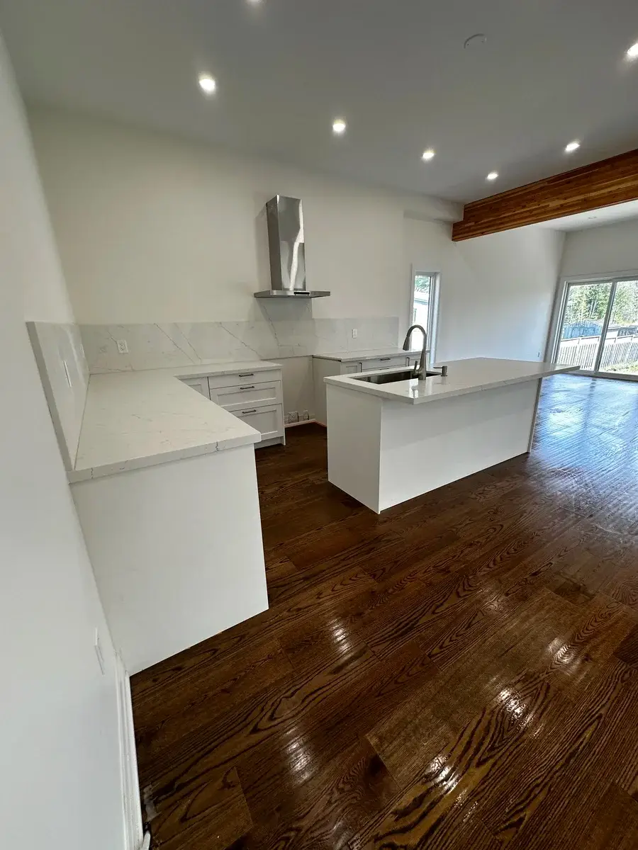 Kitchen after renovation - finished with white cabinets